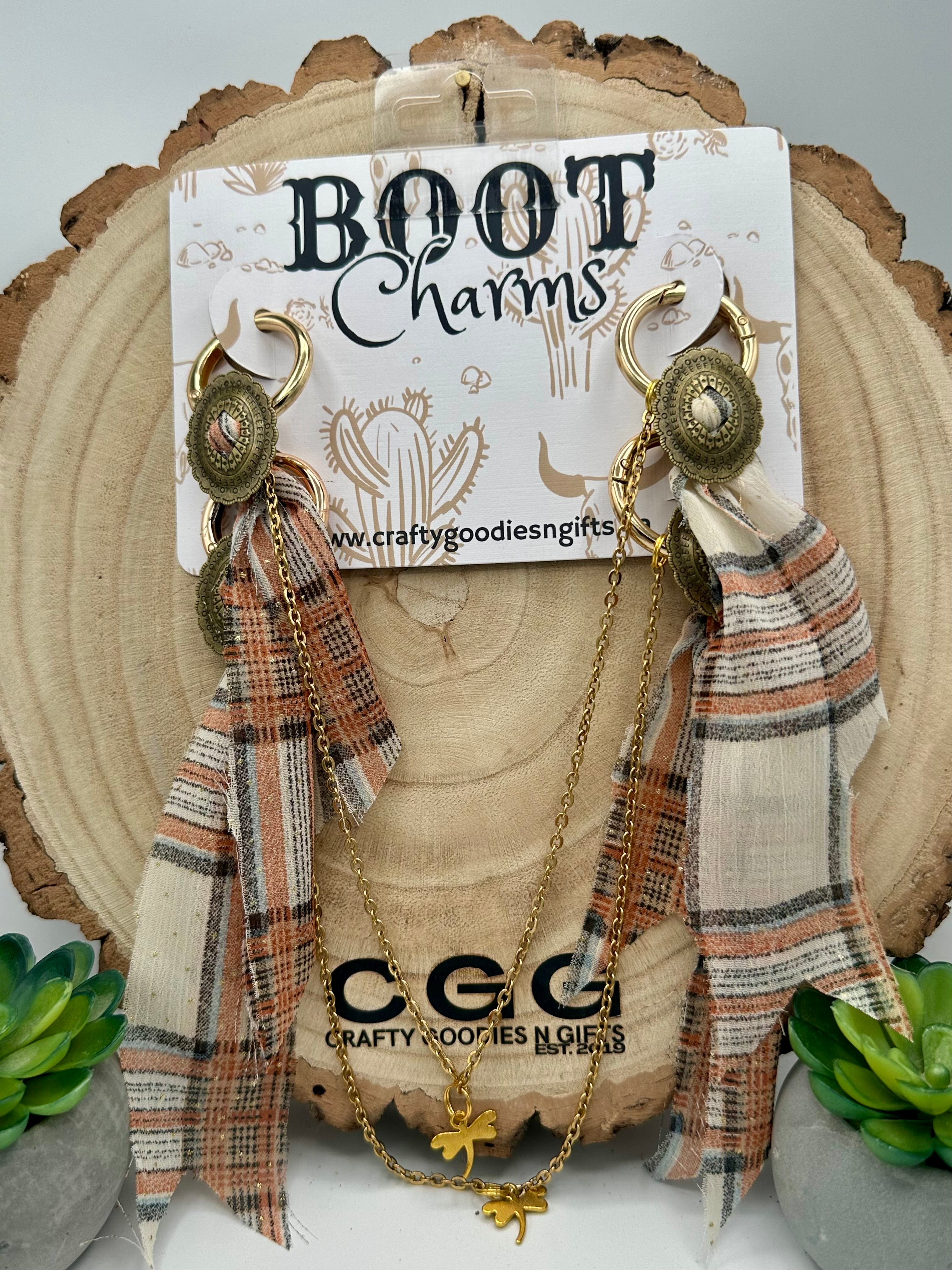 Boot Charms with gold-tone hoops, round medallion charms, and long plaid fabric tassels.