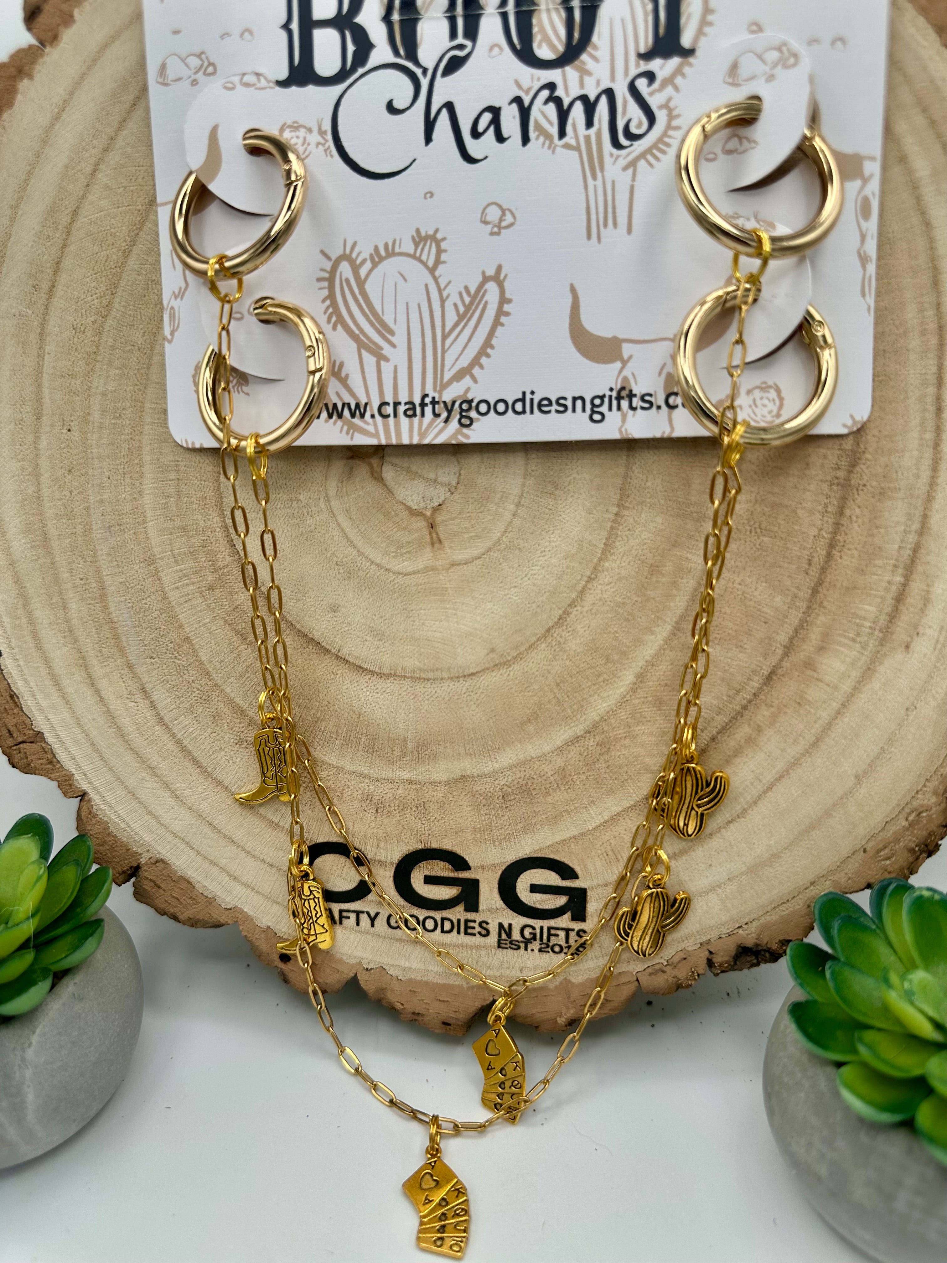 Gold hoop boot charms with layered chain dangles and a few different gold charms, cactus , cowboy boots and cards (royal flush)